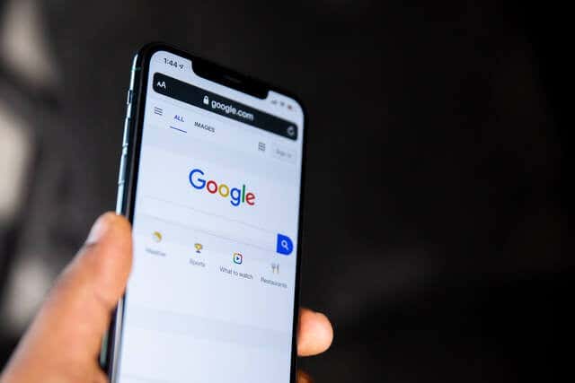 a smartphone with Googles search bar visible - 23-google-on-iphone