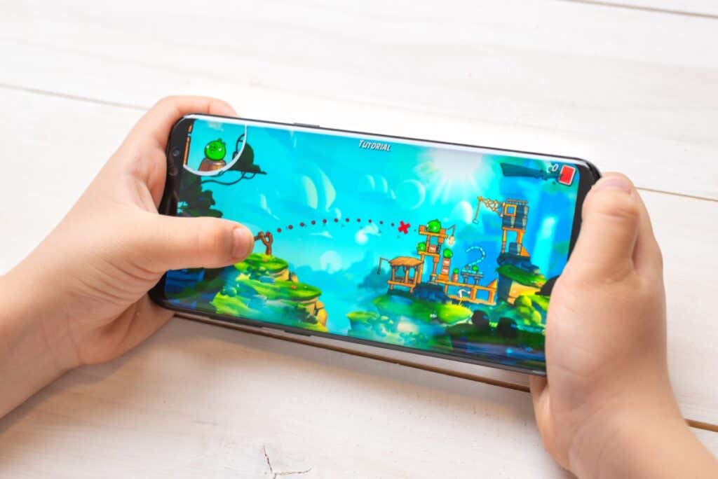 The 10 Best Ad-Free Games on Android image - Sarajevo, Bosnia and Herzegovina - November 29, 2019: Child playing Angry Birds 2 game on Samsung Galaxy S9 Plus close-up