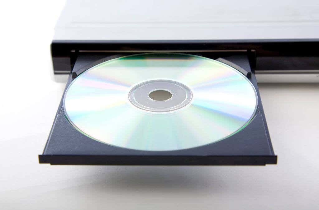 An optical disk drive inserted into a CD/DVD player