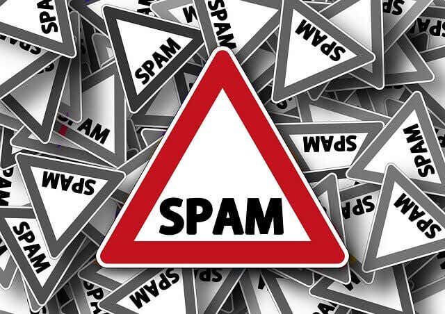 Multple triangular cards marked with the word "SPAM"