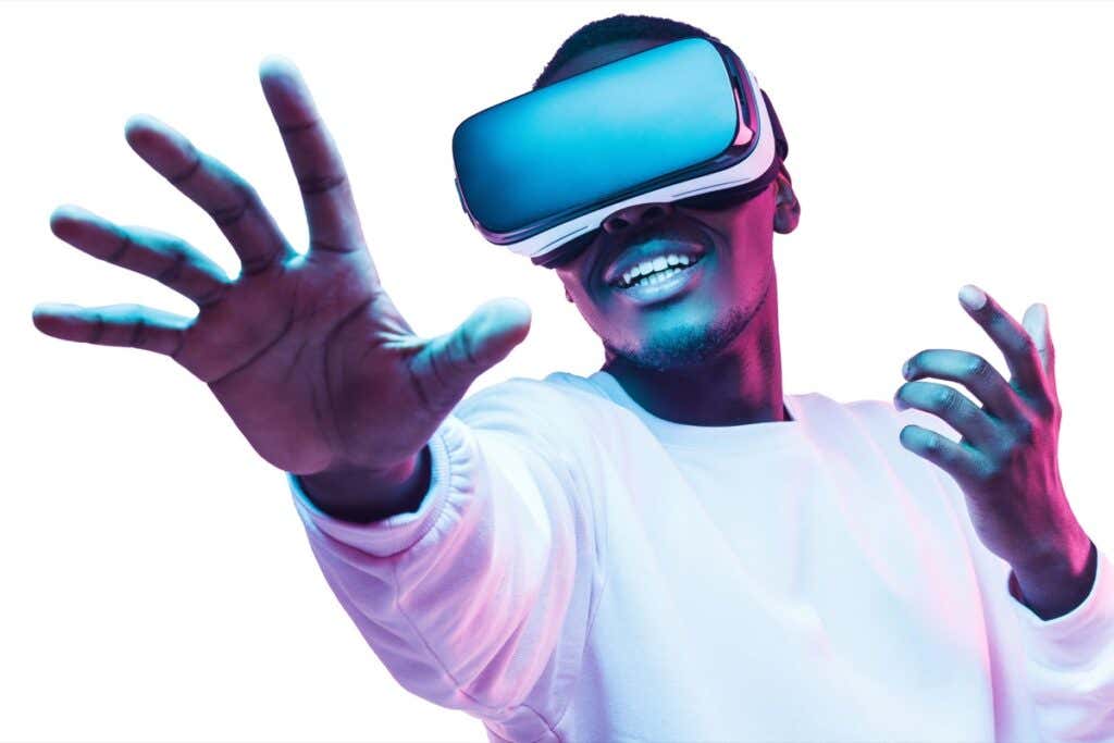 12 Best VR Games You Can Play Without a Controller image - Neon studio portrait of handsome african american male model wearing trendy sunglasses and leather jacket