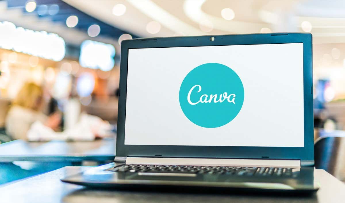  - Laptop computer displaying logo of Canva