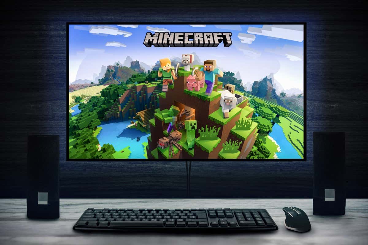  - Cali, Colombia - September 27, 2022: Minecraft video game logo on PC screen with keyboard, mouse and speakers.